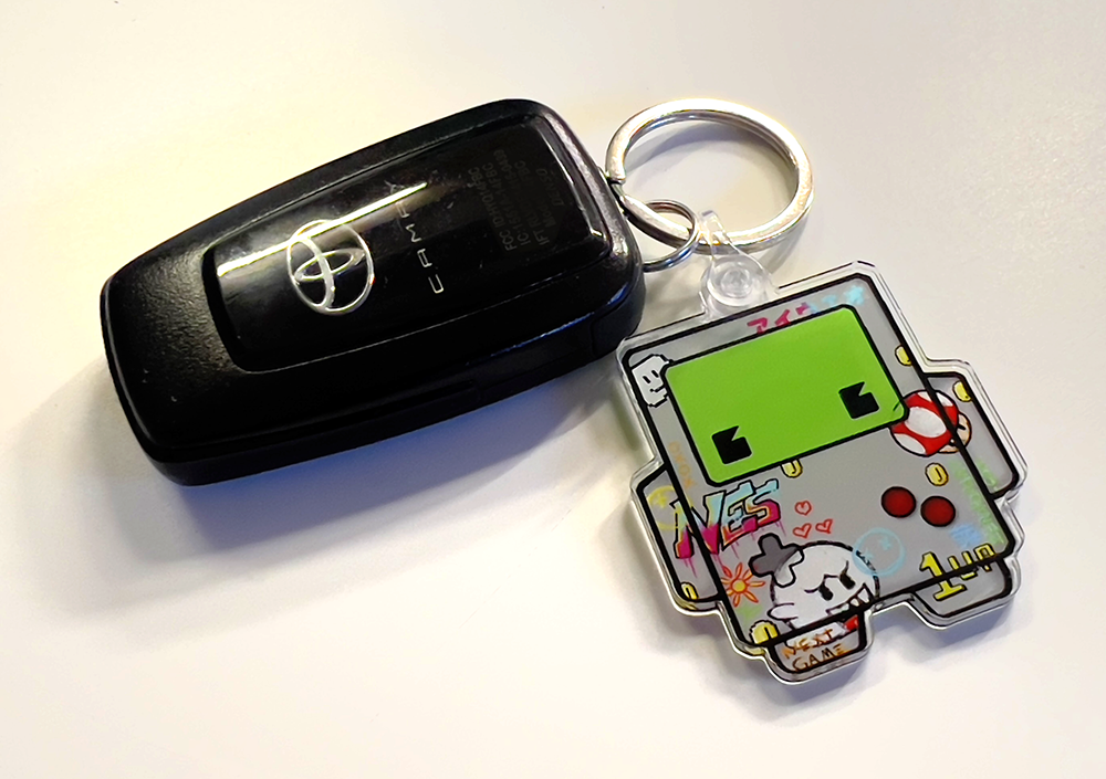 Tatted GameBot acrylic keychain